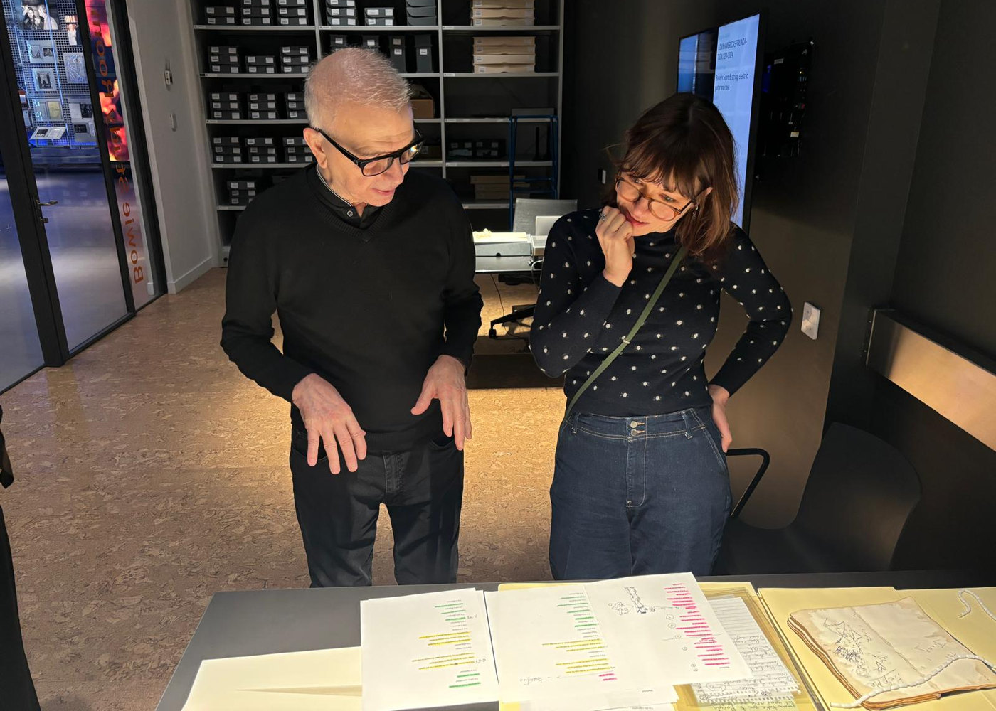 Leah Kardos and Tony Visconti examining David Bowie's Blackstar notes at the David Bowie Centre