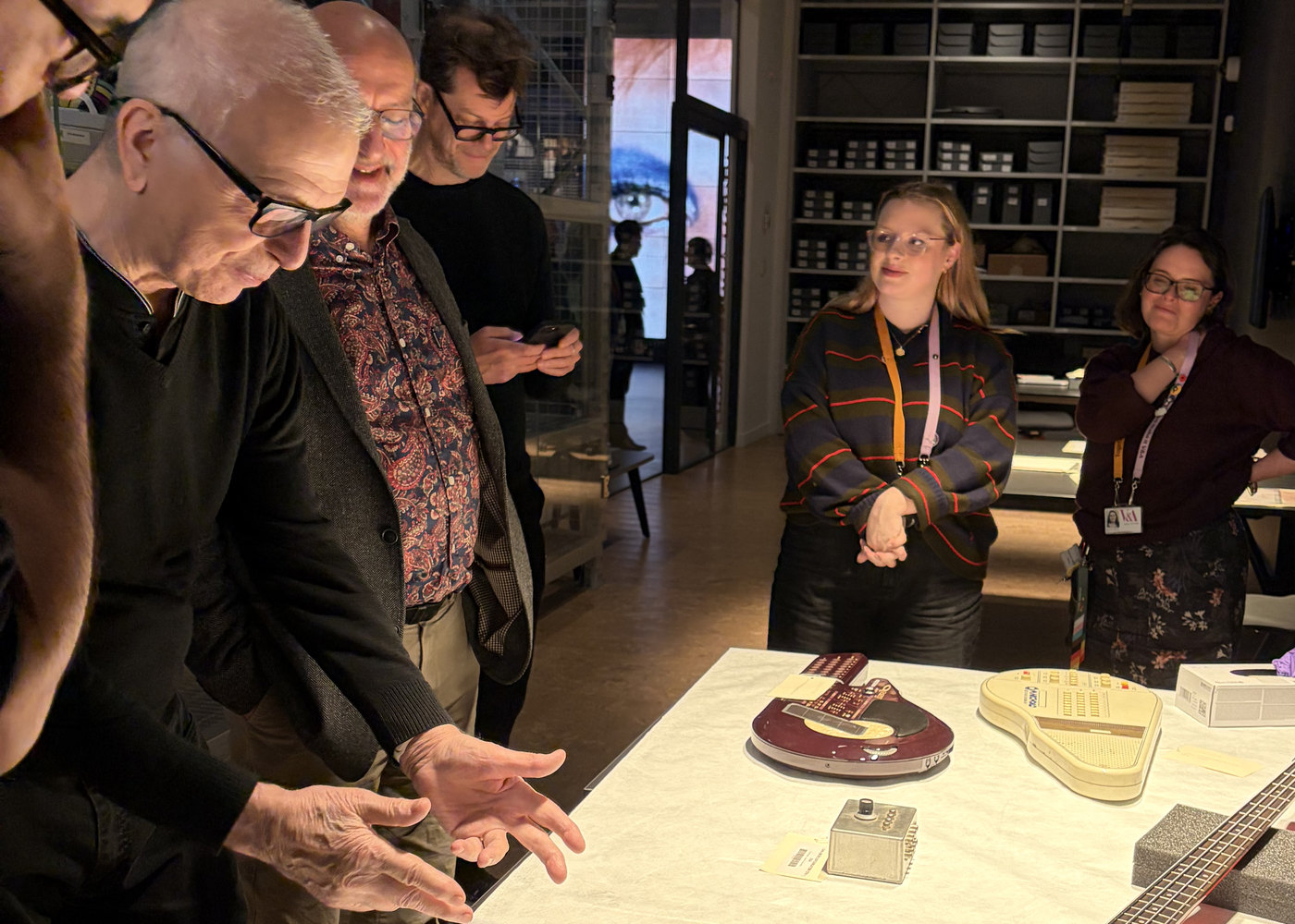 Tony Visconti pointing out an instrument from the archive