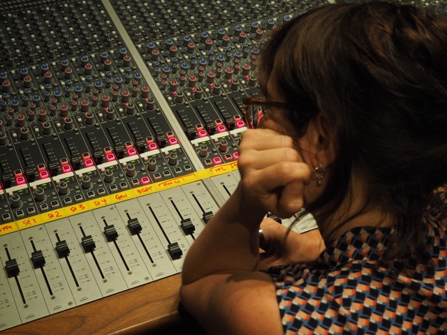 Working at the mixing desk during a session in the Visconti Studio